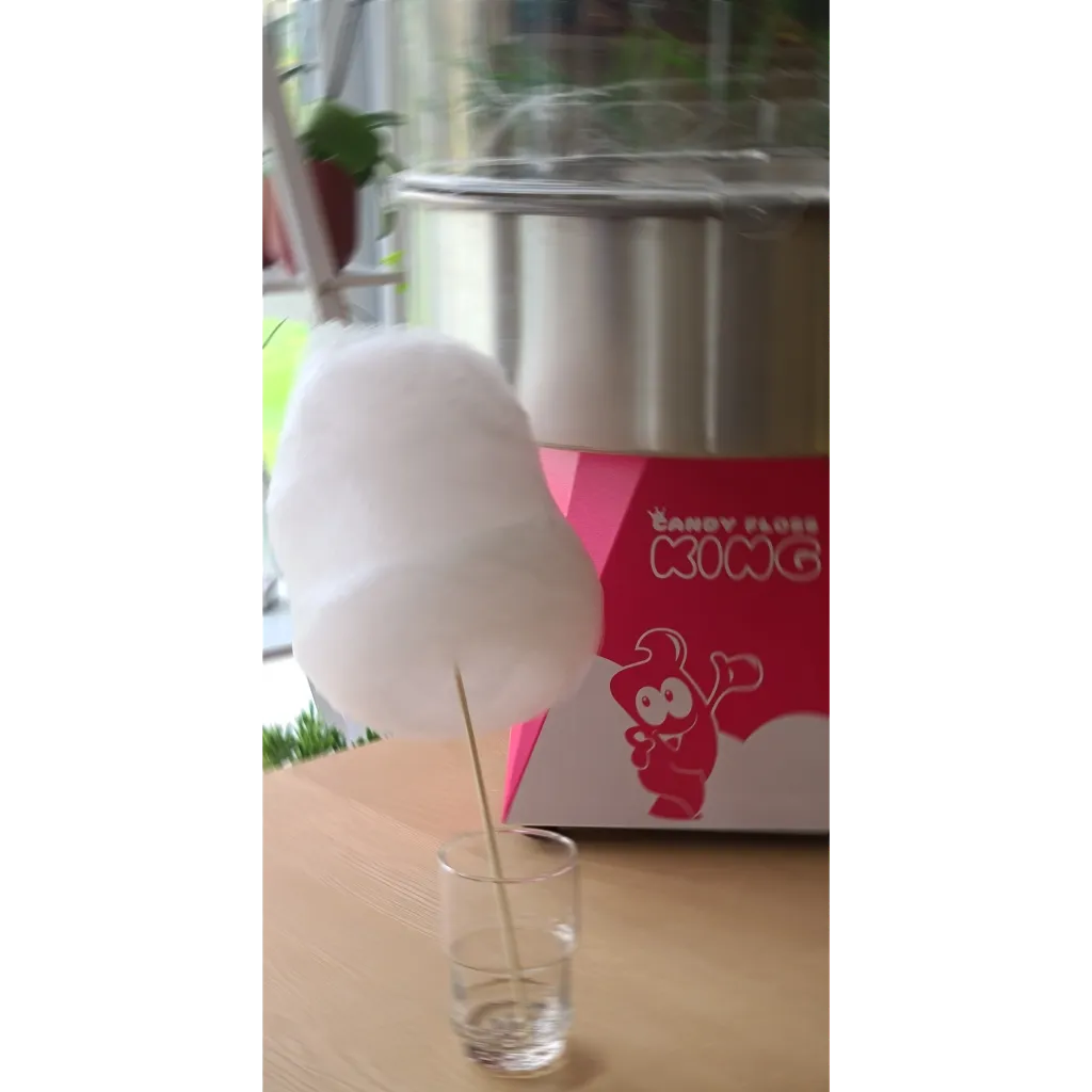 Suikerspin gemaakt door een suikerspin machine.webp